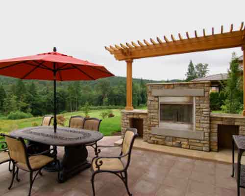Outdoor Fireplace Pictures, Picture of a Symmetrical Outdoor Stone Fireplace with Great View