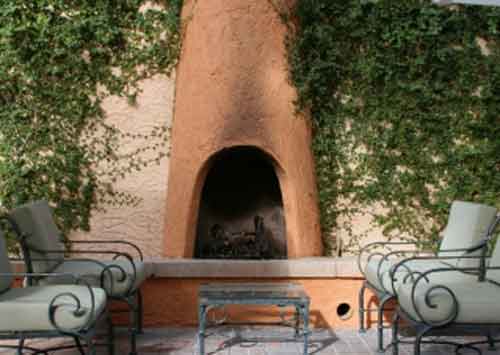 Outdoor Fireplace Pictures, Outdoor Stucco Designed Fireplace Design with Wrought Iron Seating